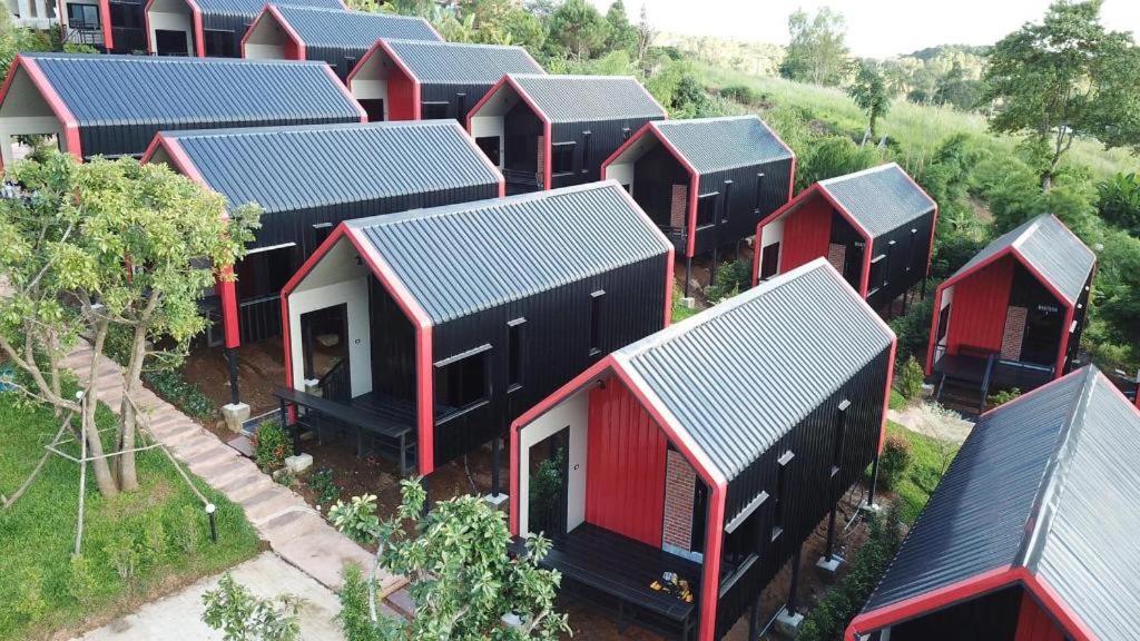 an aerial view of a row of houses with roofs at KATOON RESORT KHAO KHO in Campson