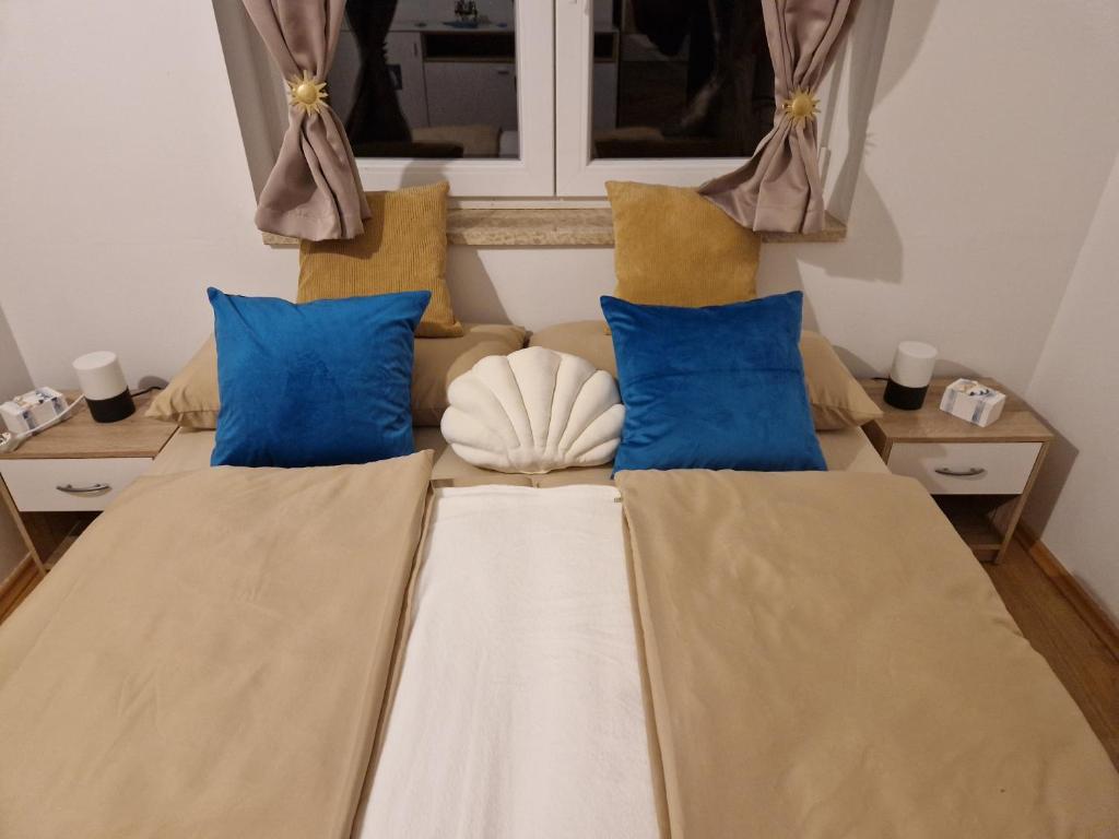 Rúm í herbergi á Apartment Lea
