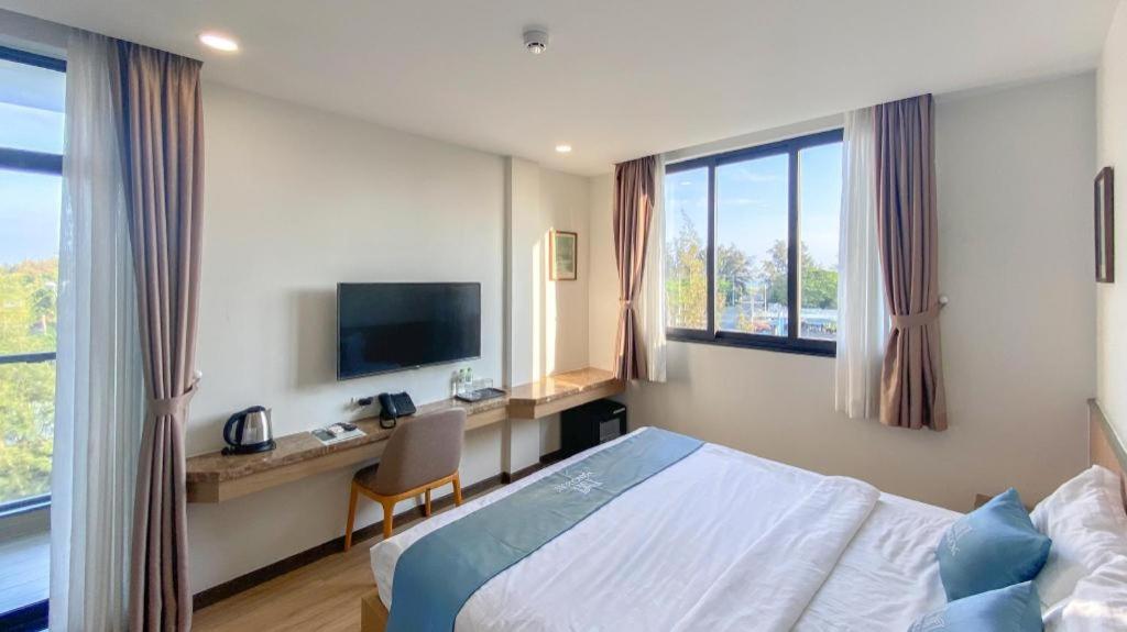 TV a/nebo společenská místnost v ubytování Mangrove Hotel Can Gio