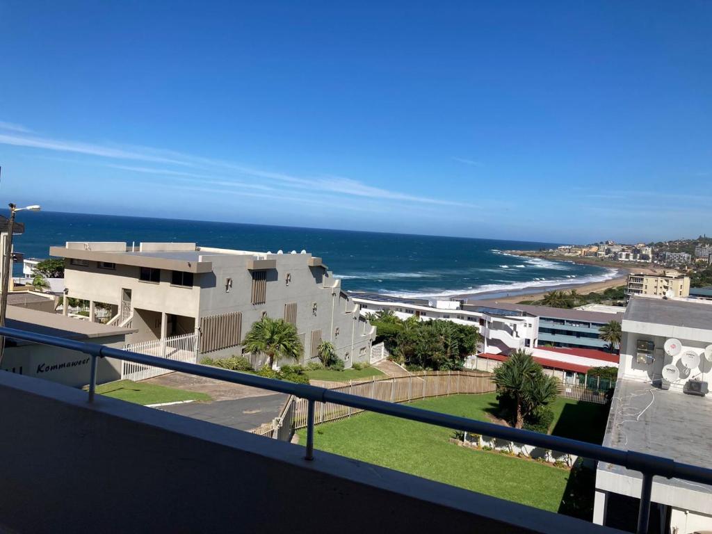 a view of the ocean from the balcony of a building at Ankers in Margate