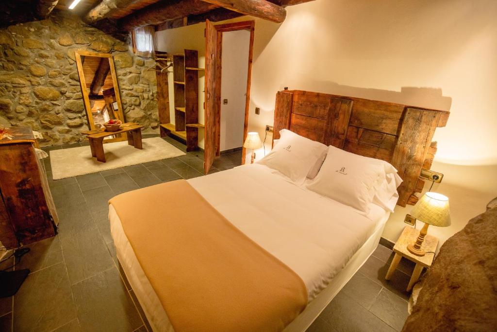 Postel nebo postele na pokoji v ubytování R de rural - Borda del Mollà