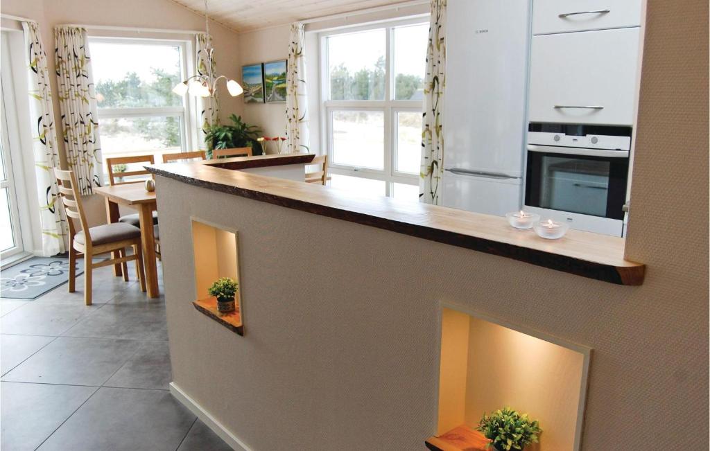 Kuchyň nebo kuchyňský kout v ubytování Holiday Home Kristinesvej Thisted Vi