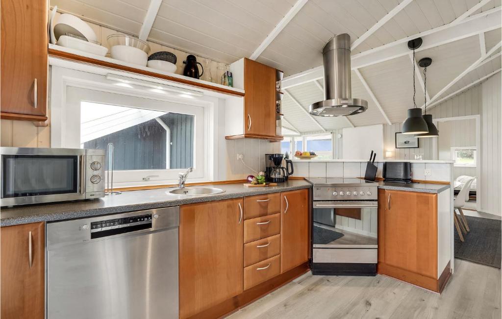 Kuchyň nebo kuchyňský kout v ubytování Holiday Home Vinkelbæk Nordborg