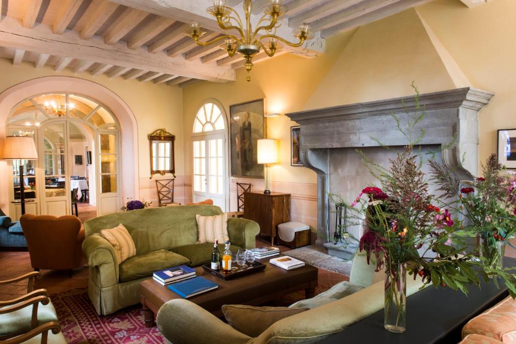 Posezení v ubytování Borgo Pignano Tuscany