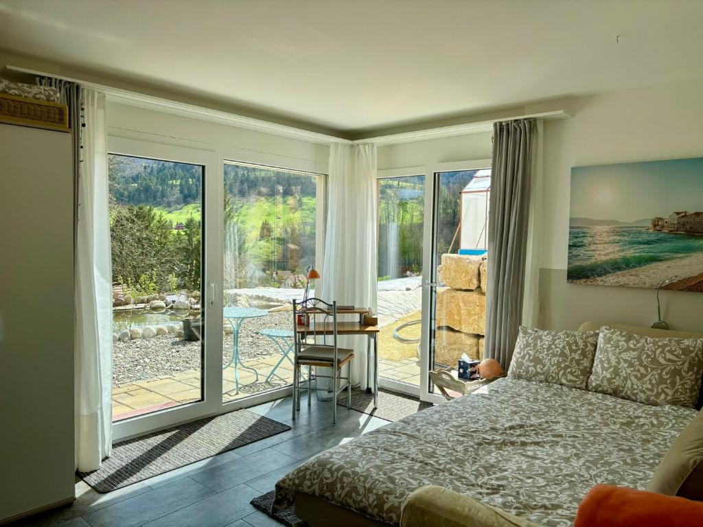 Postel nebo postele na pokoji v ubytování Chez Svanette B&B Villa Sonnglück