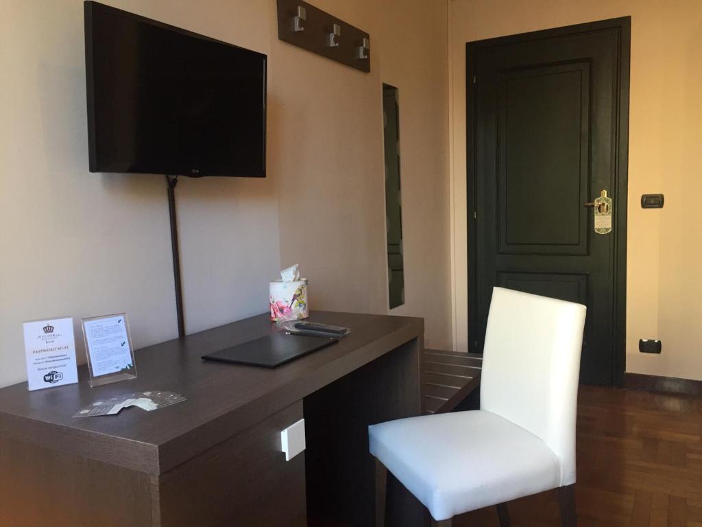 TV a/nebo společenská místnost v ubytování Guesthouse Vittoria Rooms - the Original since 2015