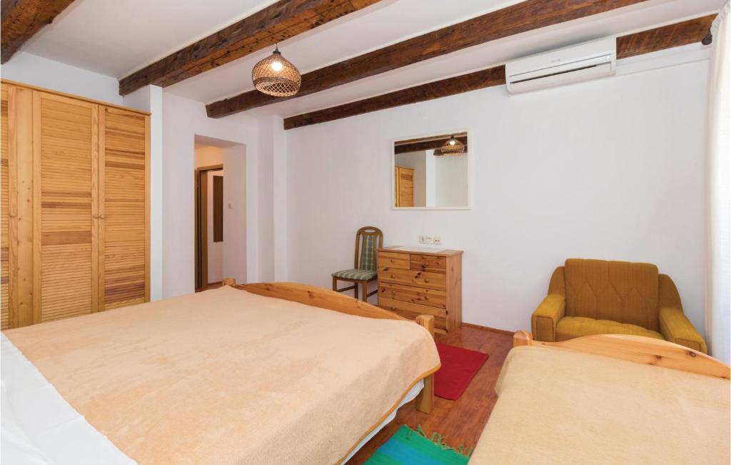 Łóżko lub łóżka w pokoju w obiekcie Holiday Home Ul,biskupa Josipa Marcelica Cr