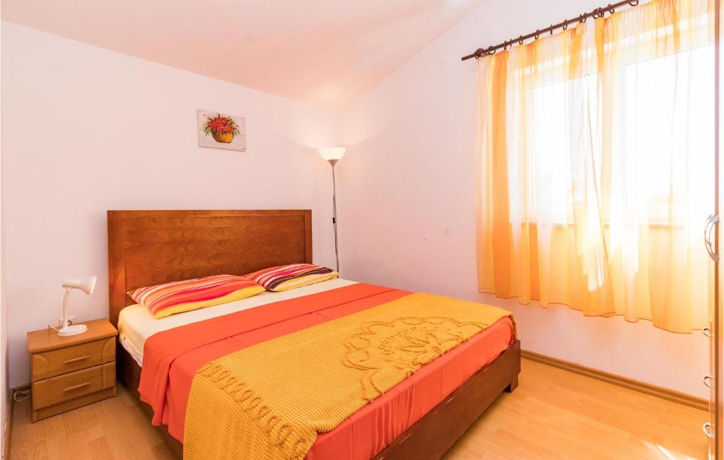 Postel nebo postele na pokoji v ubytování Holiday Home Pomer Pomer