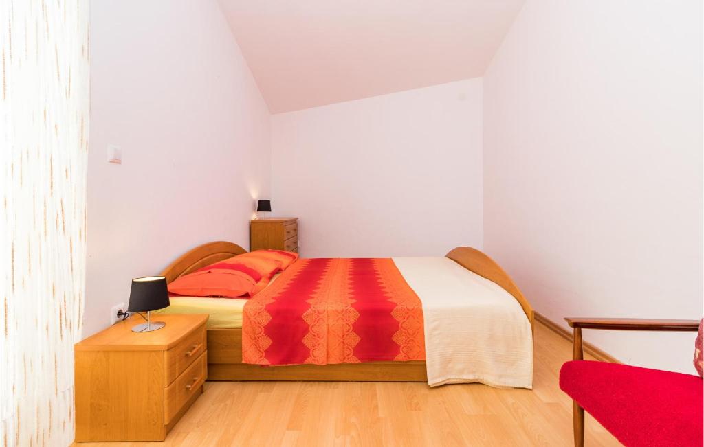 Postel nebo postele na pokoji v ubytování Holiday Home Pomer Pomer