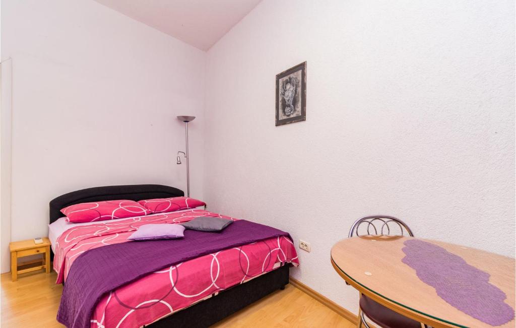 Postel nebo postele na pokoji v ubytování Holiday Home Pomer Pomer