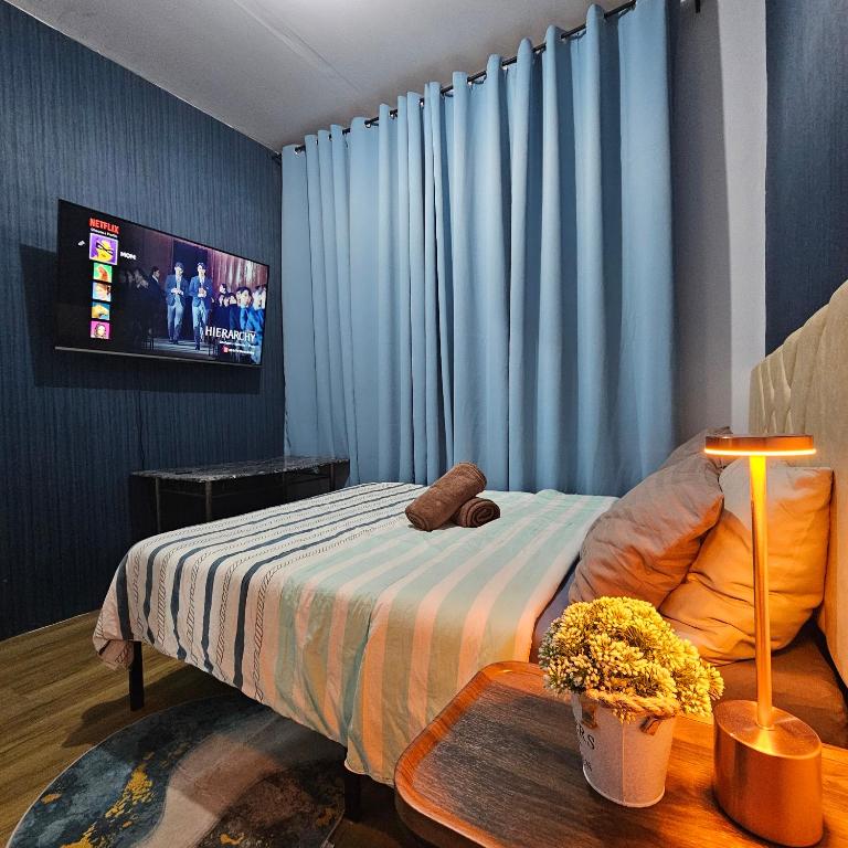 Postel nebo postele na pokoji v ubytování Davao City Airport Transient Rooms by Lemonique