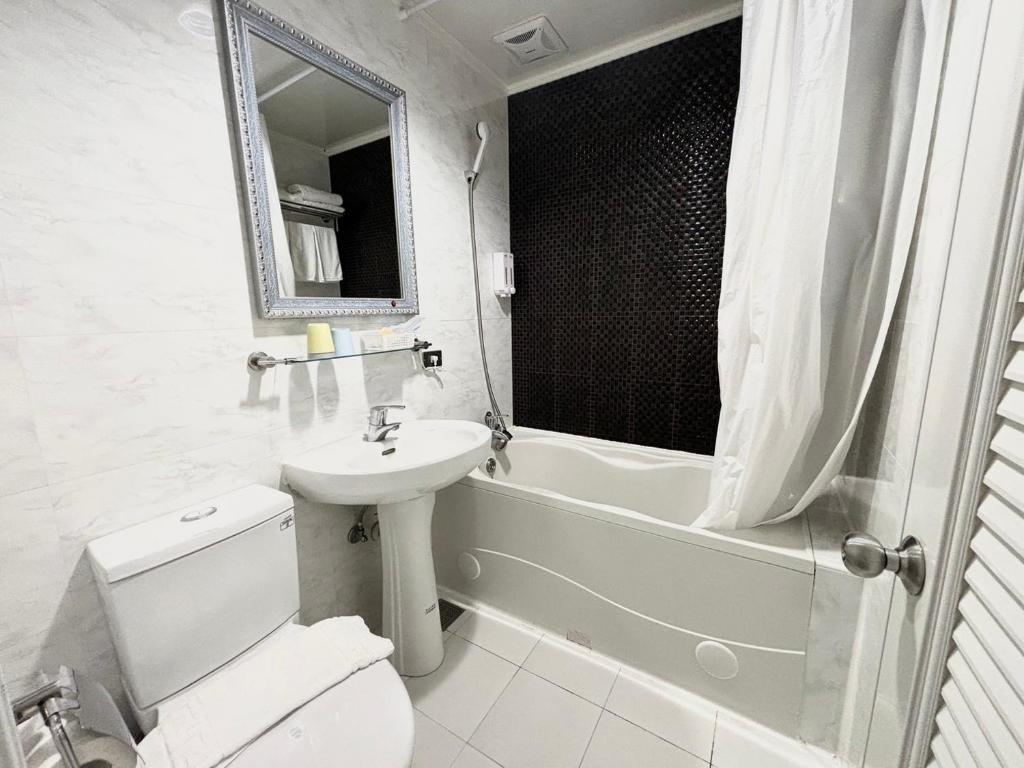 Koupelna v ubytování Ximen Hotel