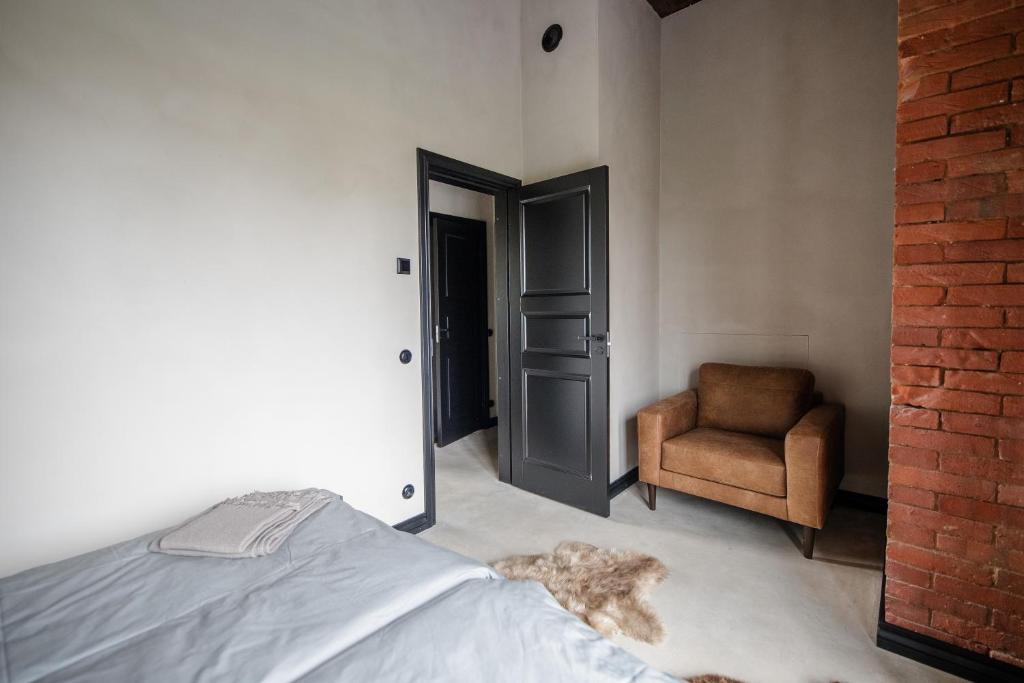 Postel nebo postele na pokoji v ubytování Ilmaveere Butiikhotell ja Restoran