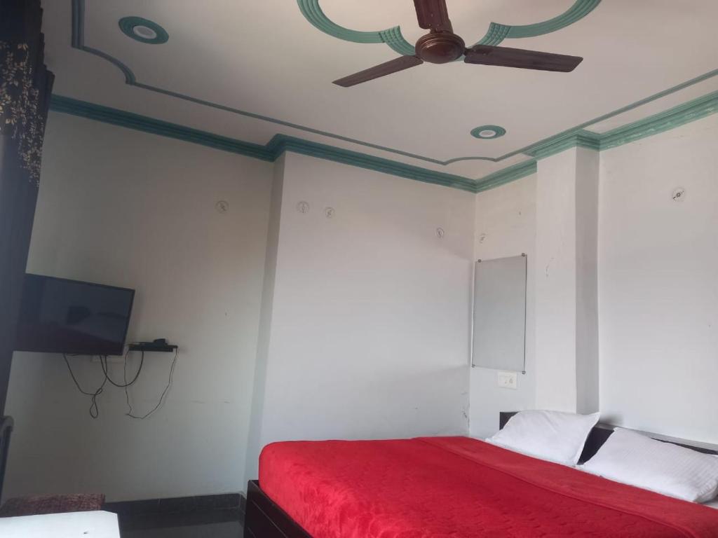 Postel nebo postele na pokoji v ubytování HOTEL GRAND GLORRYy