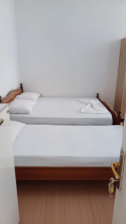 Postel nebo postele na pokoji v ubytování Hotel Justinian
