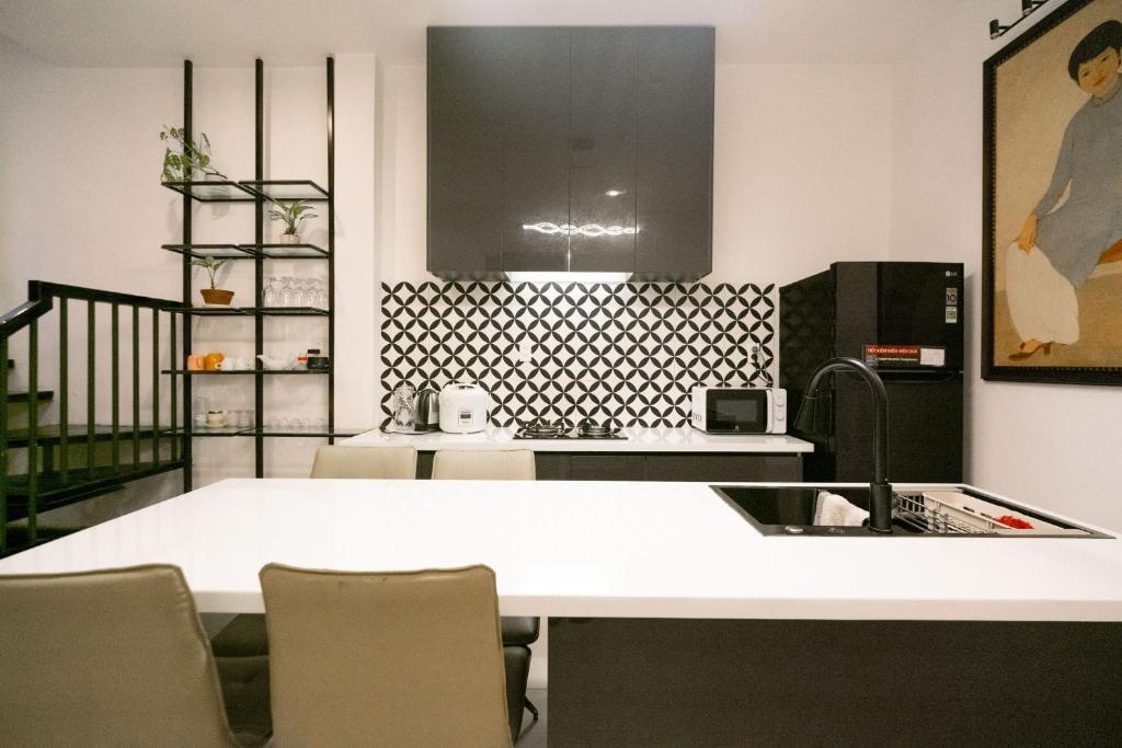 Kuchyň nebo kuchyňský kout v ubytování Mia's House Hue