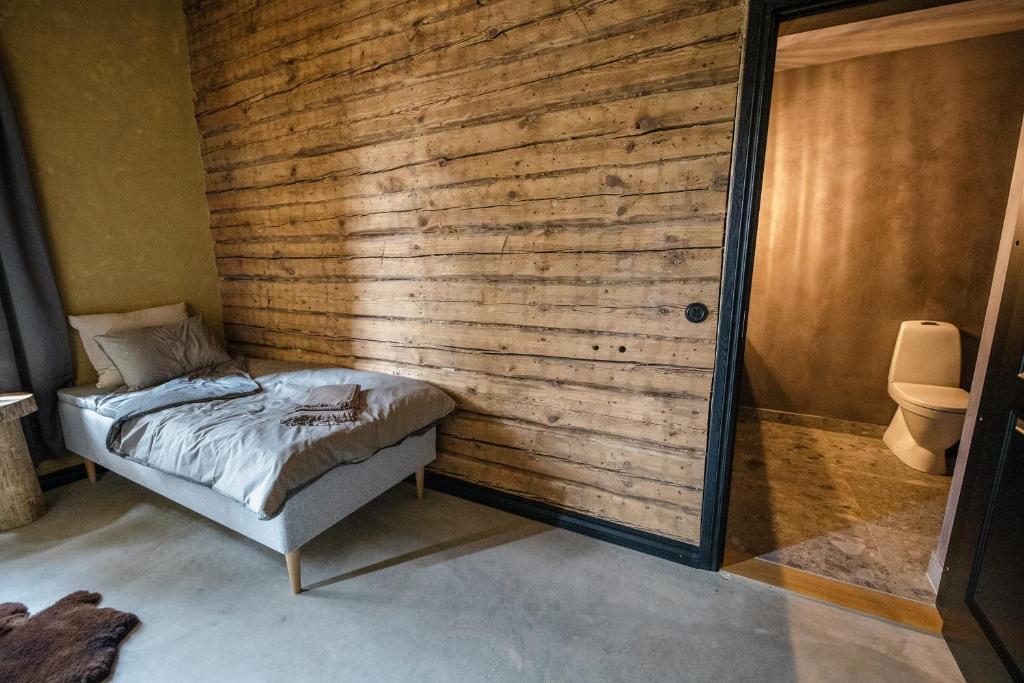 Postel nebo postele na pokoji v ubytování Ilmaveere Butiikhotell ja Restoran
