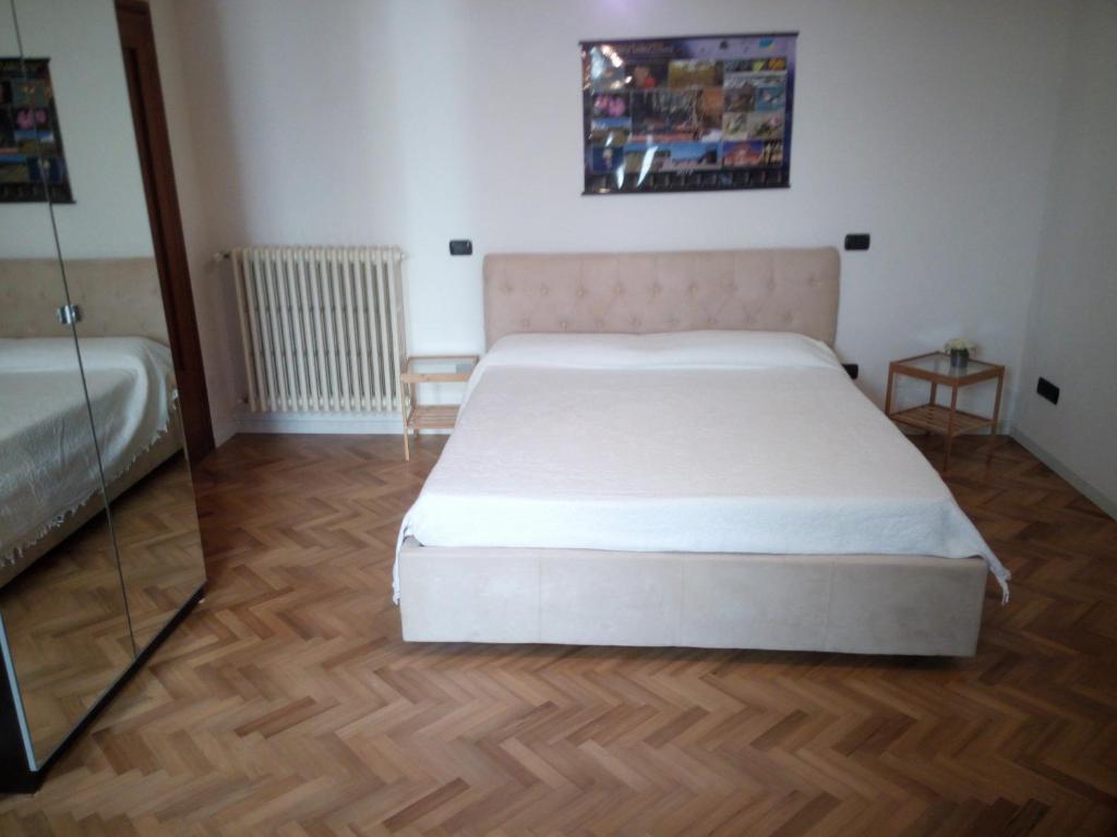 Postel nebo postele na pokoji v ubytování Alla Torre Con Vista
