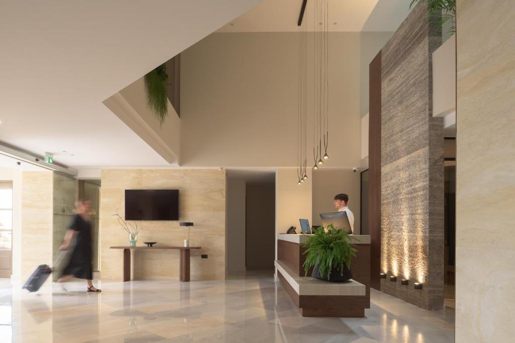 TV a/nebo společenská místnost v ubytování Hotel Ideon