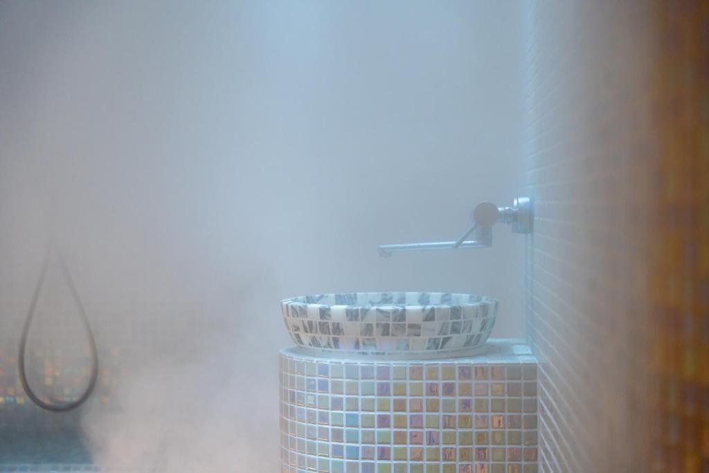 Koupelna v ubytování Lazy Bear Moderan Spa na Planini