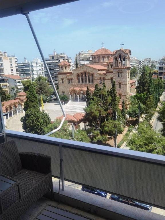 a view of a building from a balcony at 110 Sqm 2BR Edem beach luxury apartment in Athens