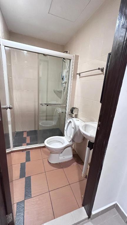Koupelna v ubytování New YX oasis hotel 新悦喜雅居自助酒店