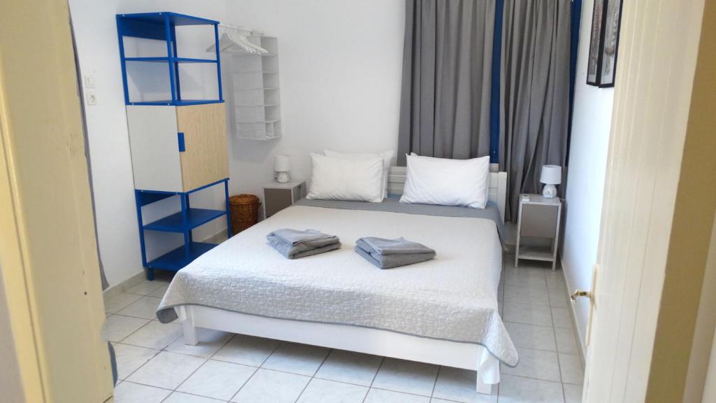 Posteľ alebo postele v izbe v ubytovaní Captain's Beach Apartments