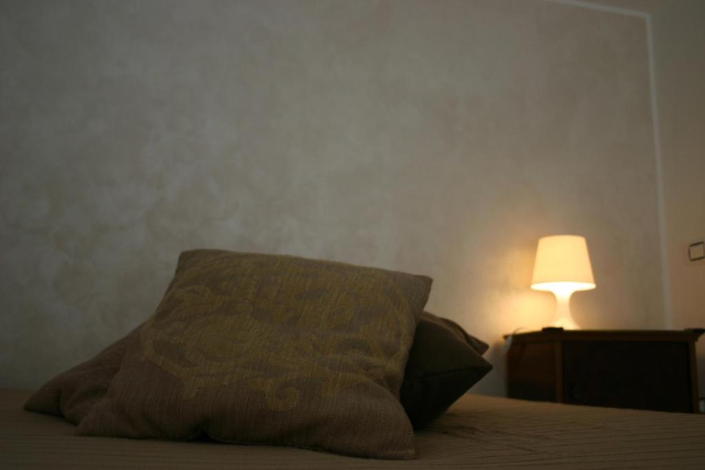 Postel nebo postele na pokoji v ubytování B&B Dimora Lucia e Dalila