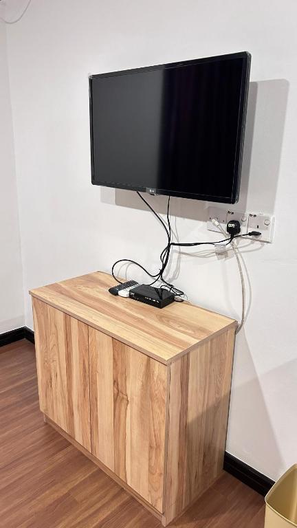 TV a/nebo společenská místnost v ubytování New YX oasis hotel 新悦喜雅居自助酒店