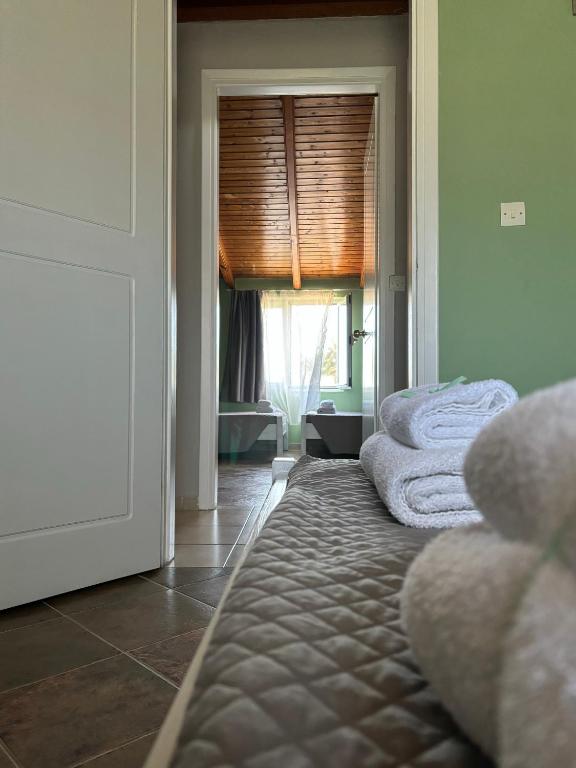 Postel nebo postele na pokoji v ubytování Demis Apartments