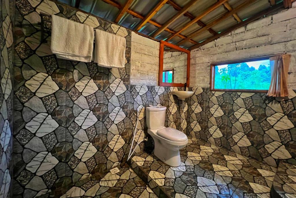 Koupelna v ubytování Aulia Bungalows