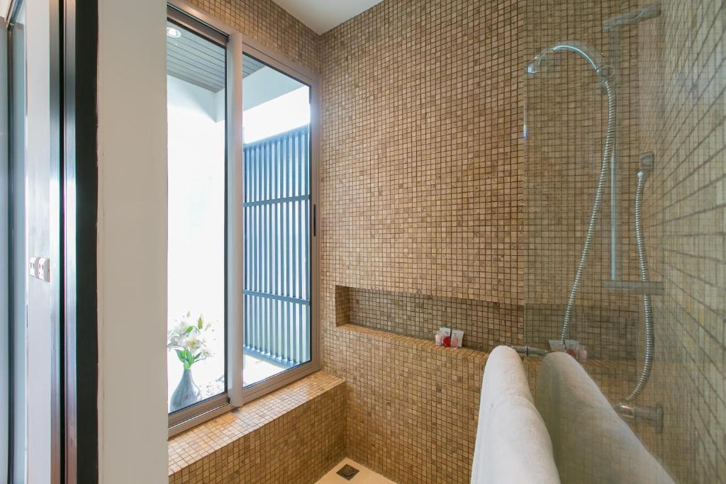 Koupelna v ubytování Kata Gardens Penthouse sea view 4C near Kata Noi Beach