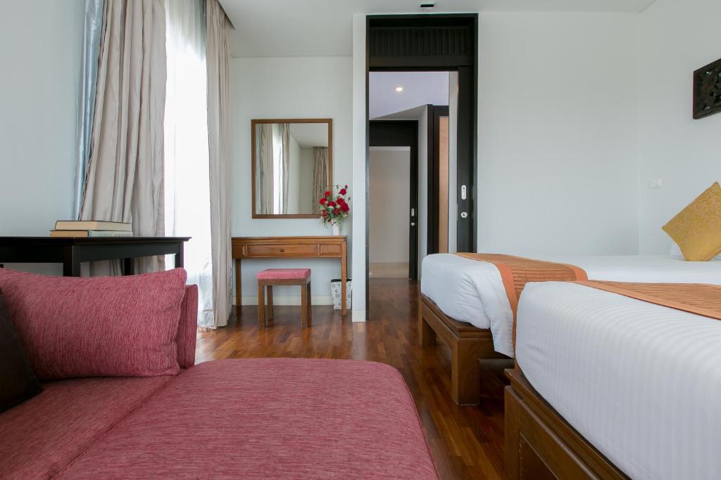 Postel nebo postele na pokoji v ubytování Kata Gardens Penthouse sea view 4C near Kata Noi Beach