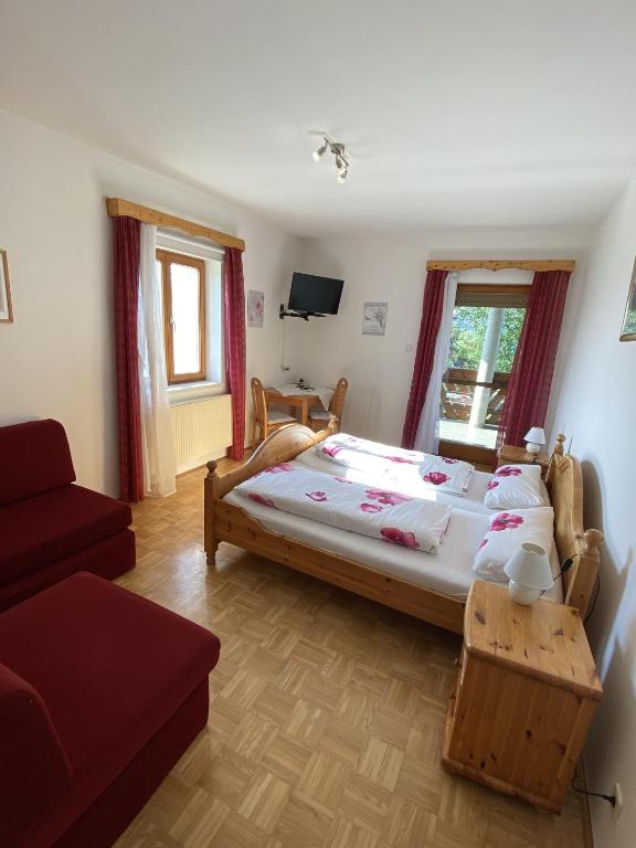 Postel nebo postele na pokoji v ubytování Gästezimmer Weisch