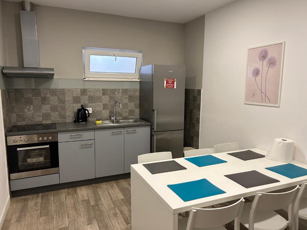 Kuchyň nebo kuchyňský kout v ubytování Rooms Bruno
