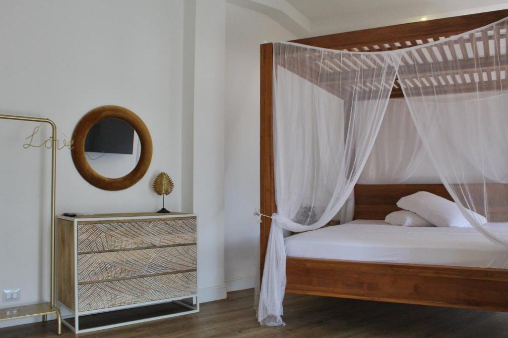 Postel nebo postele na pokoji v ubytování Domino Hotel