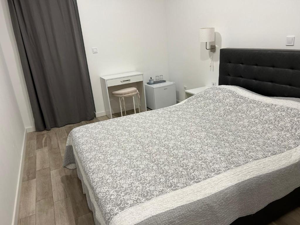 Postel nebo postele na pokoji v ubytování Rooms Bruno