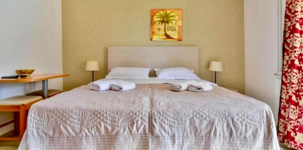 Postel nebo postele na pokoji v ubytování Apartments Kentera LUX