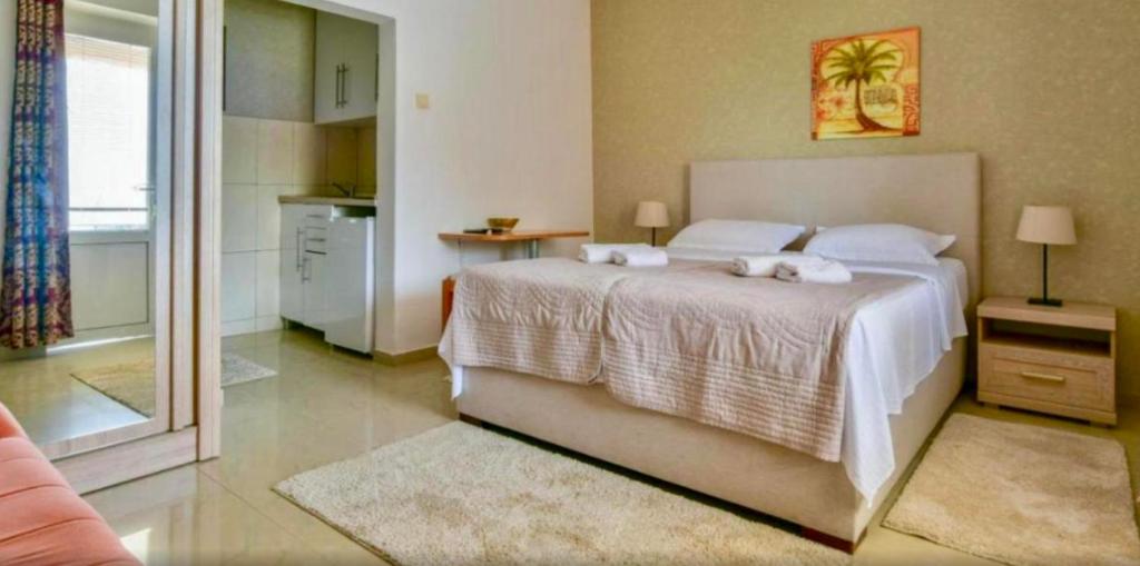 Postel nebo postele na pokoji v ubytování Apartments Kentera LUX