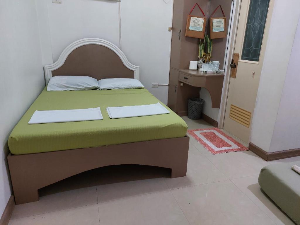 Postel nebo postele na pokoji v ubytování Yuken Mari Beach Resort Panglao