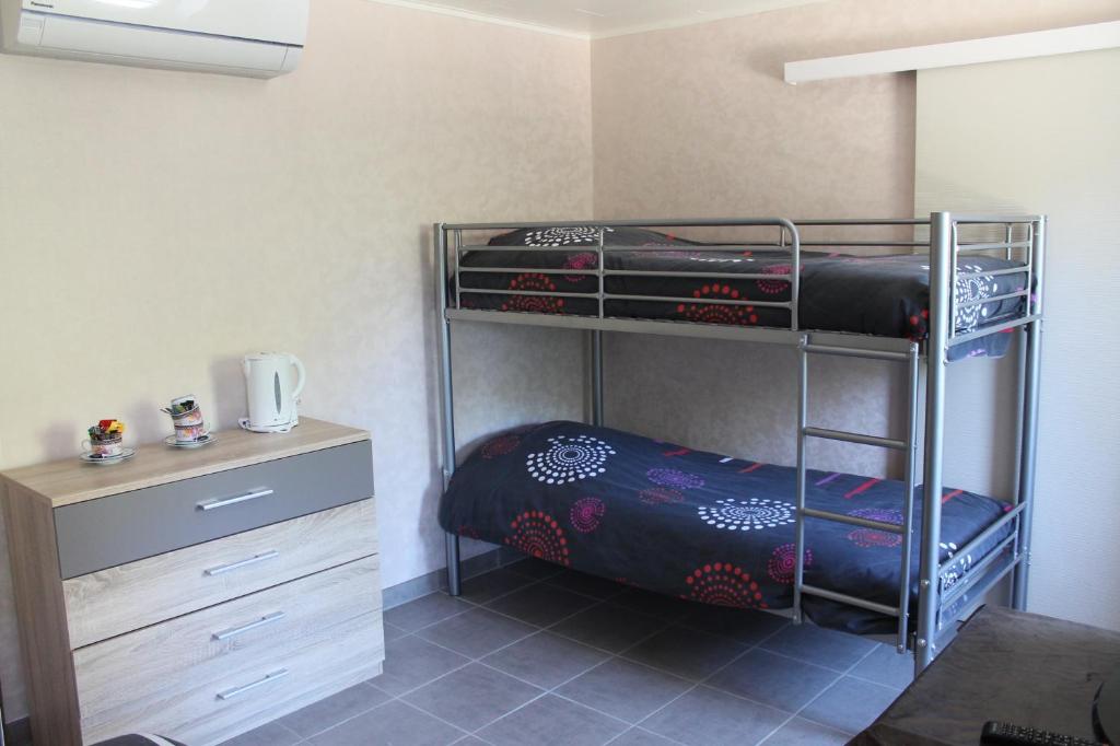 Postel nebo postele na pokoji v ubytování Retour Aux Sources