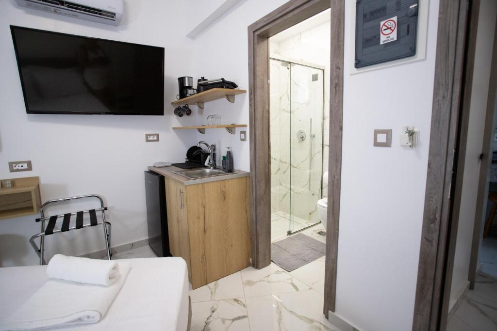 Kuchyň nebo kuchyňský kout v ubytování Star Hotel