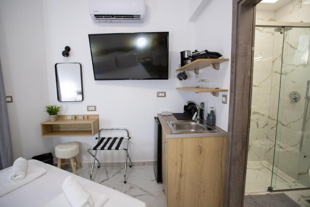 Kuchyň nebo kuchyňský kout v ubytování Star Hotel