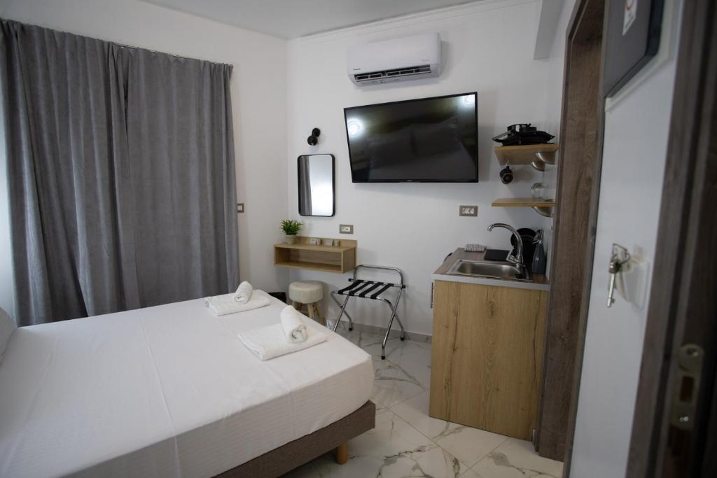TV a/nebo společenská místnost v ubytování Star Hotel