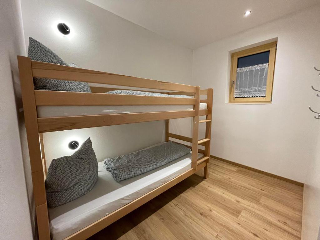 Postel nebo postele na pokoji v ubytování Appartement Mona