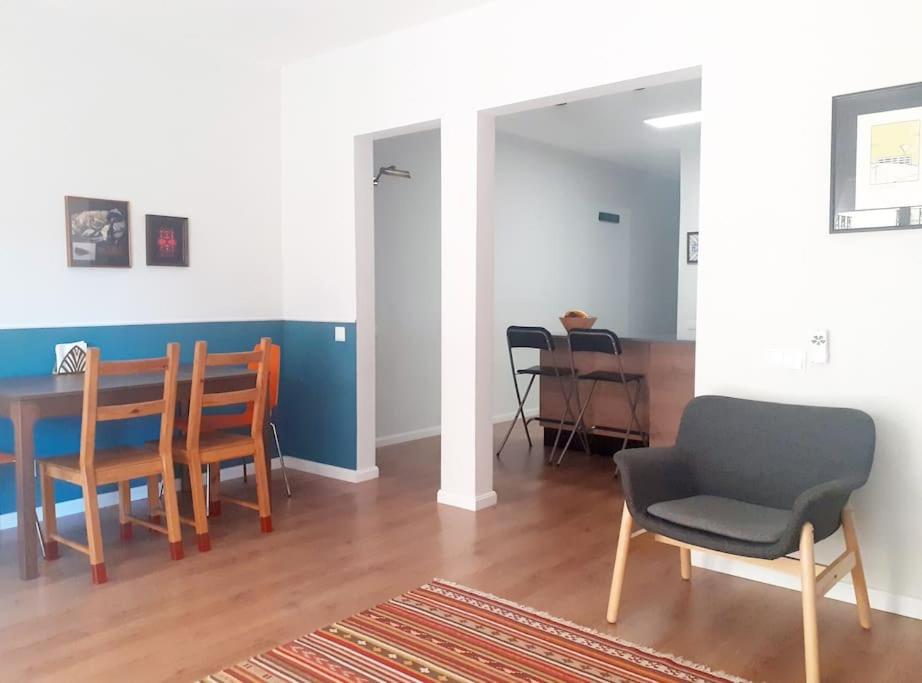 a living room with a dining room table and chairs at Vacation house in the mountains in Esparraguera