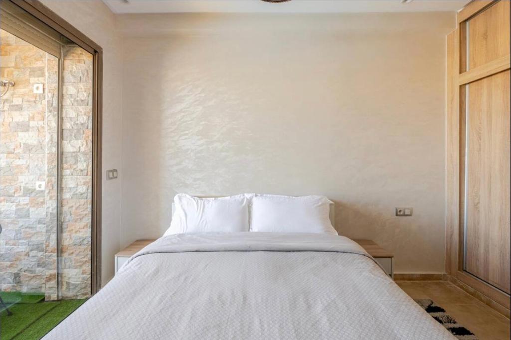 Foto sihtkohas Mansouria asuva majutusasutuse Appartement Élégant avec une belle Vue sur Piscine galeriist