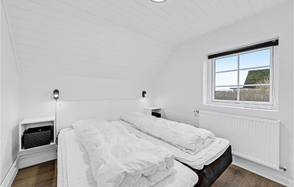 Postel nebo postele na pokoji v ubytování Lovely Home In Ringkøbing With Sauna