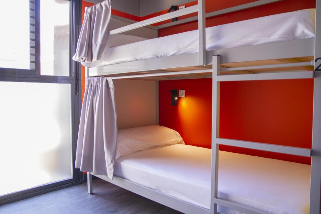 Postel nebo postele na pokoji v ubytování room00 Valencia Hostel