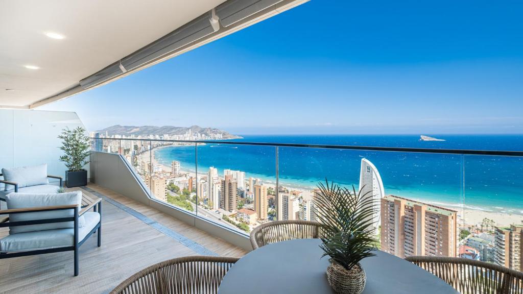 a balcony with a view of the beach and ocean at Benidorm Beach, Grupo AMI in Benidorm